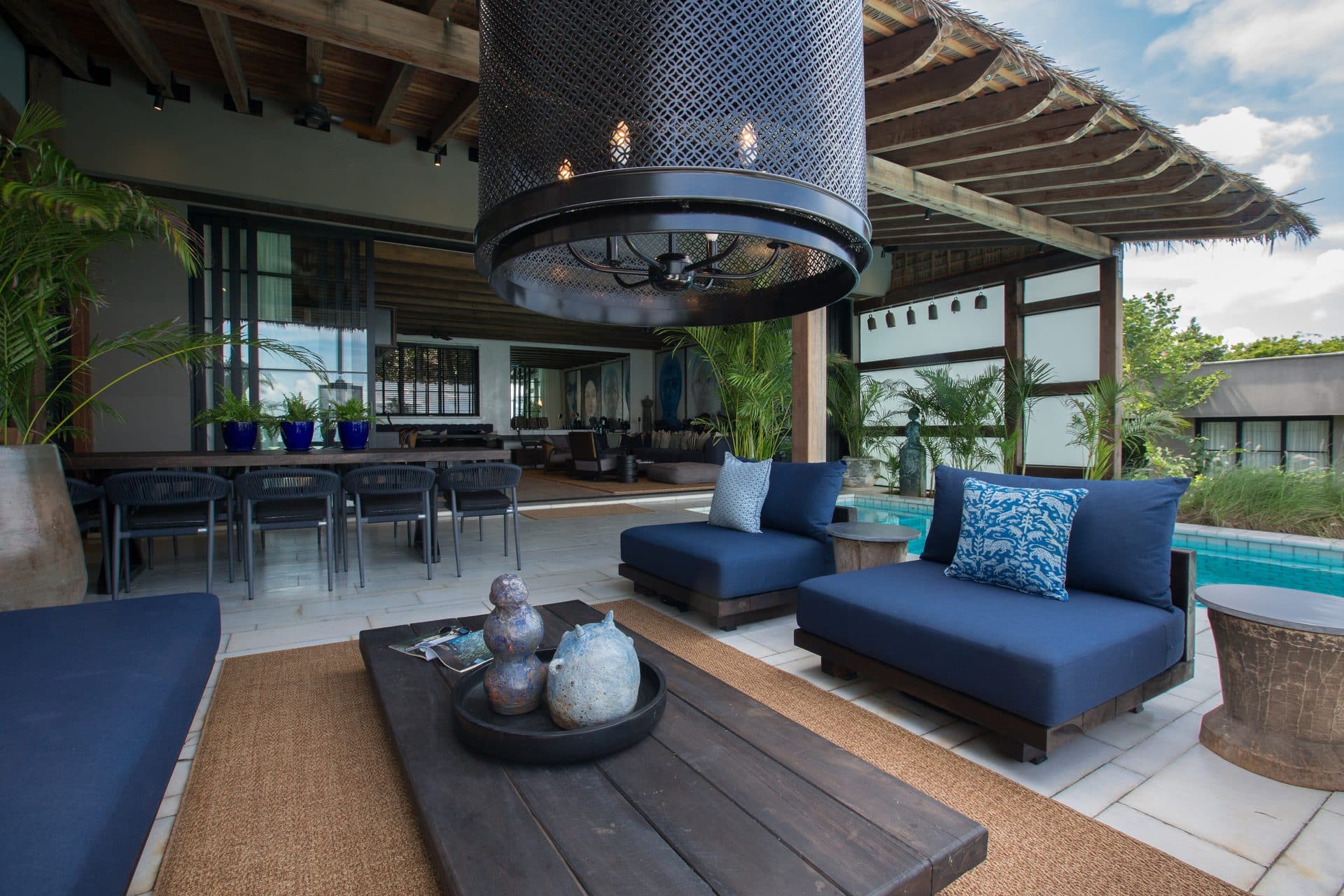 Blue terrace seating by the pool edge