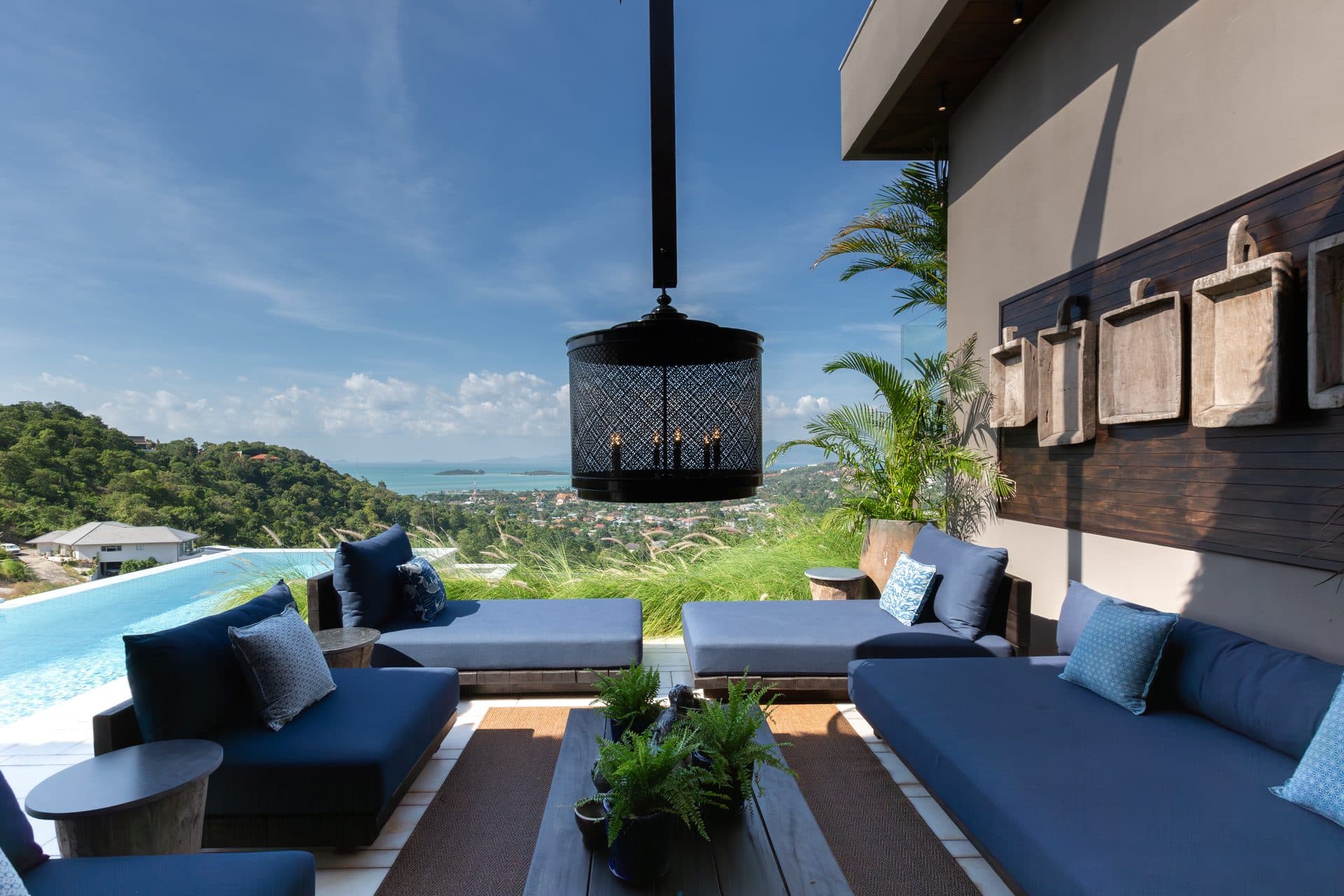 Terrace lounge with pool and open sea view